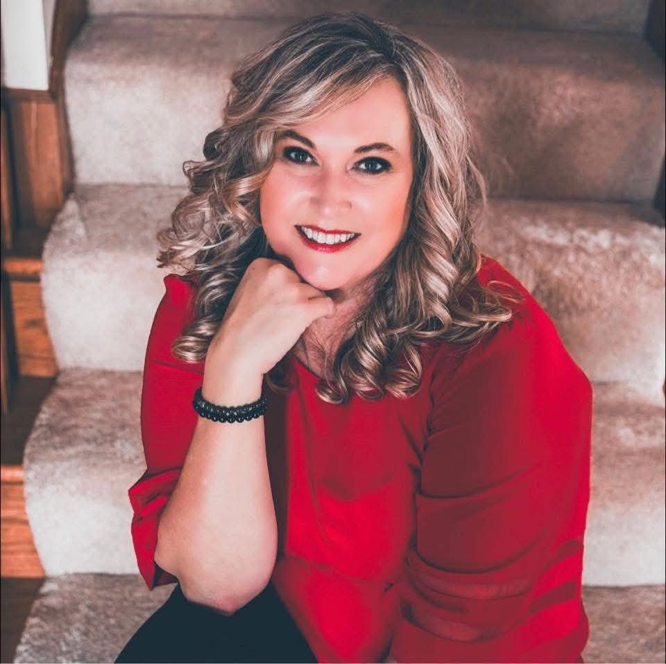 Nikki Snow, children's author, smiling.